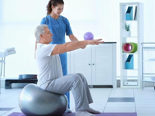 Physiotherapist guiding a patient through exercises at Bluebell Hospital